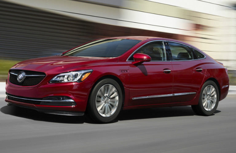 Red 2019 Buick LaCrosse Sport Touring driving on road exterior front driver side view